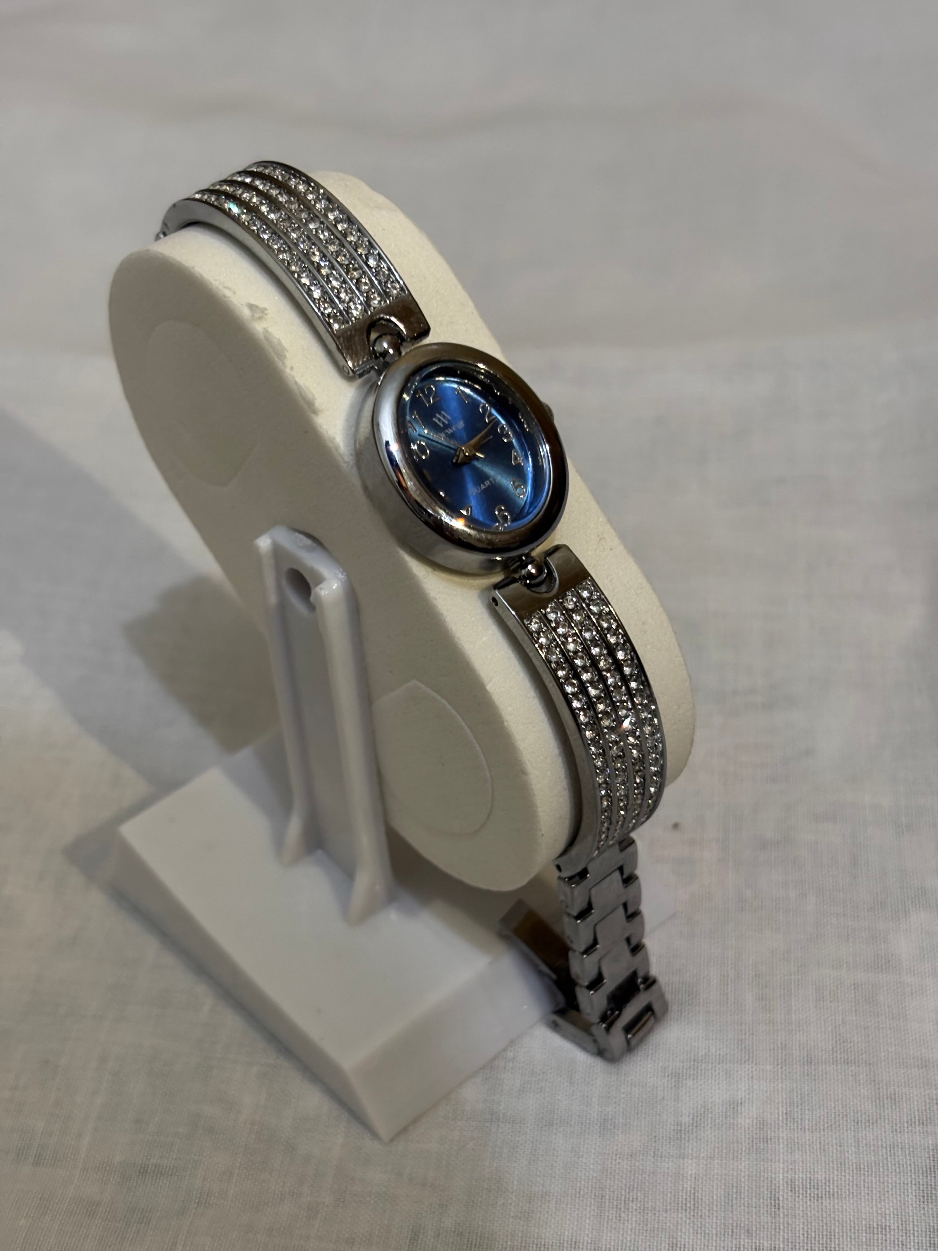 Silver watch with sky dial